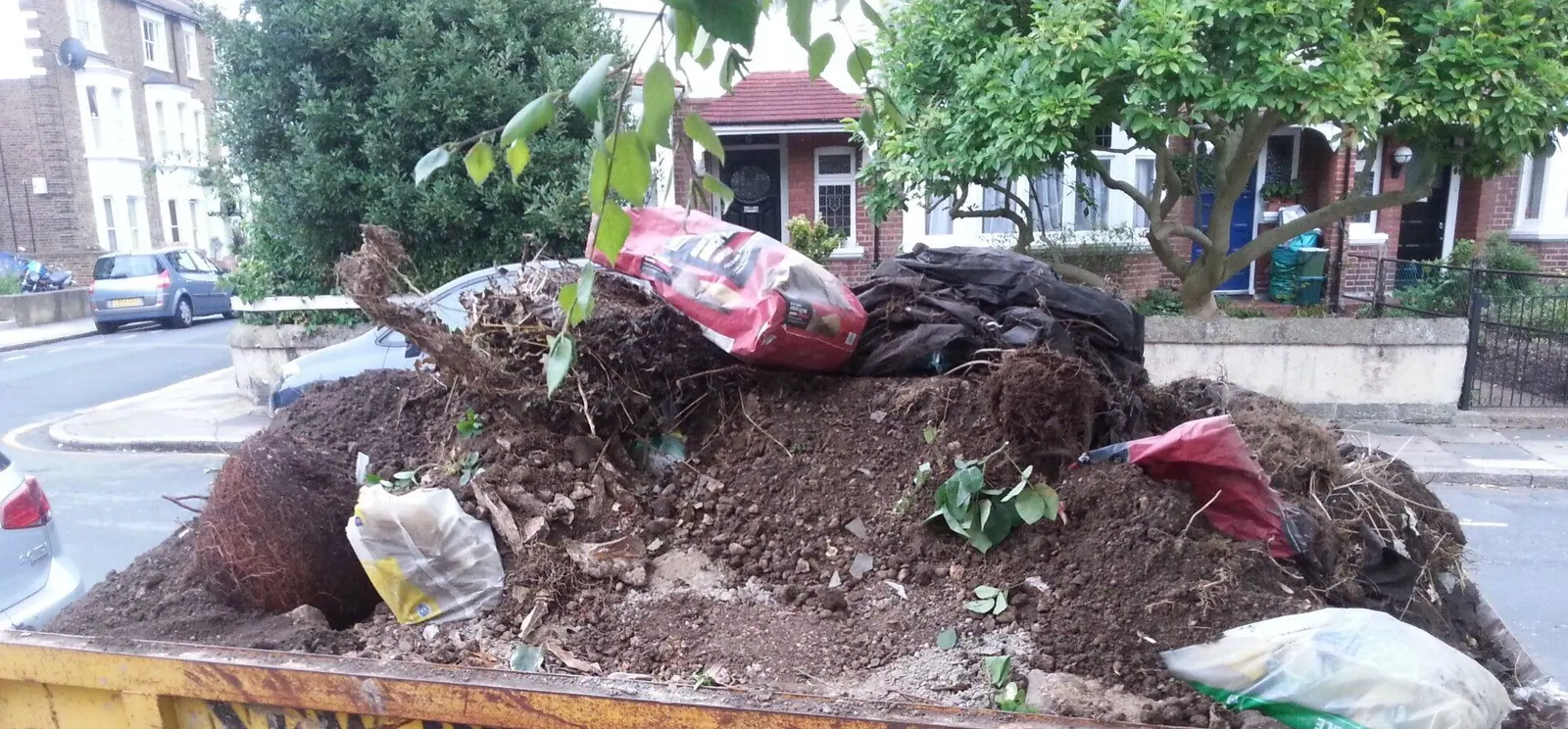 A full load of soil, roots and plant waste removed from a garden